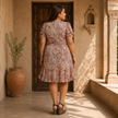 Paisley Print Ruffle Hem Dress with Tie Neck